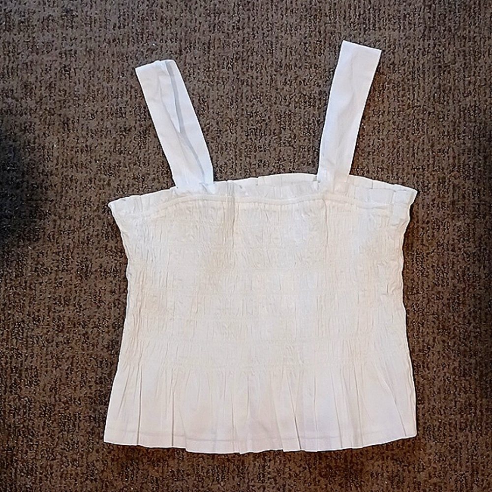 Scrunched/ribbed, white, tank top. Never worn, still has tags